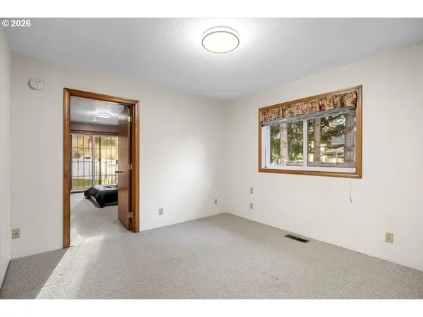 a view of an empty room with window