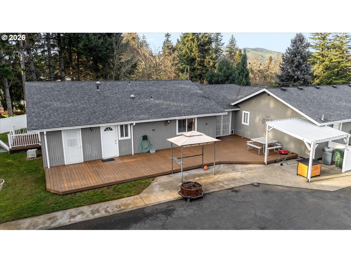 369 Upper Camp Loop Road Roseburg, OR 97470 - Photo 29 of 38 a house view with a garden space