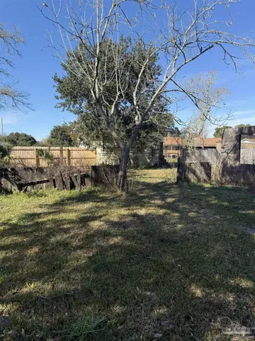 a view of a yard with an outdoor space