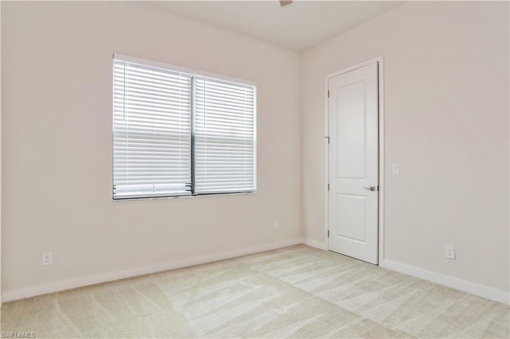 14867 Loggerhead Drive Naples, FL 34120 - Photo 15 of 21 an empty room with a window