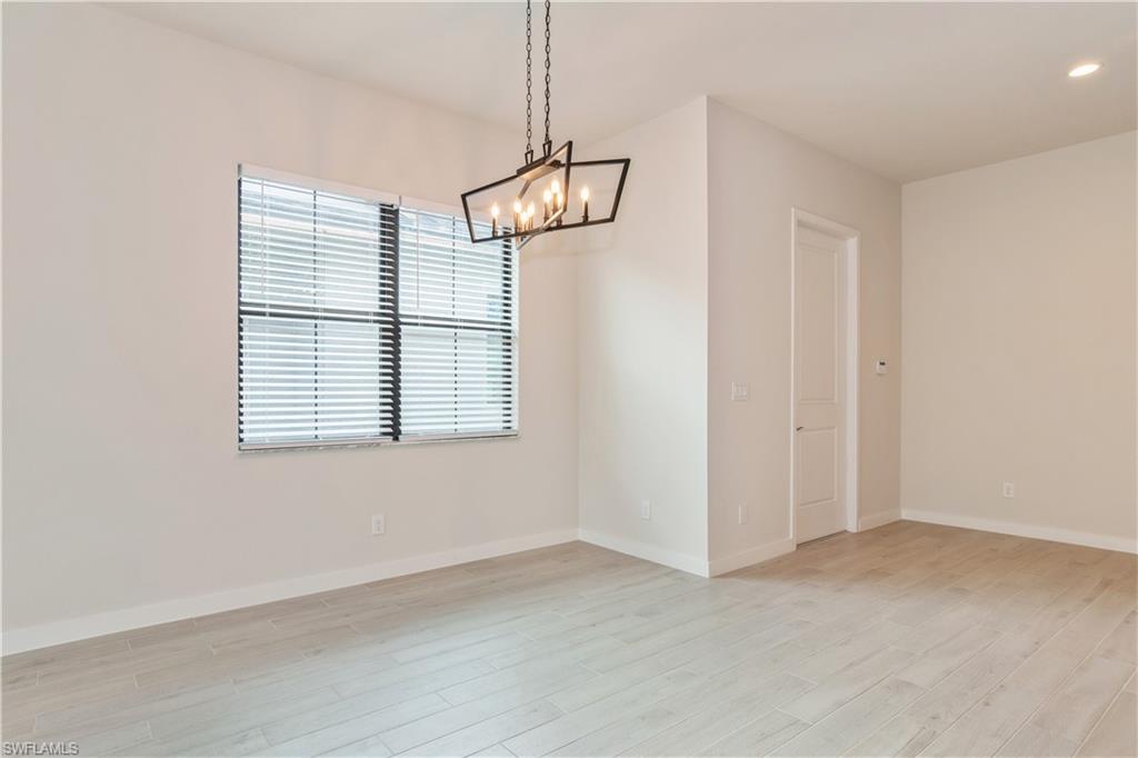 14867 Loggerhead Drive Naples, FL 34120 - Photo 7 of 21 a view of an empty room with a window
