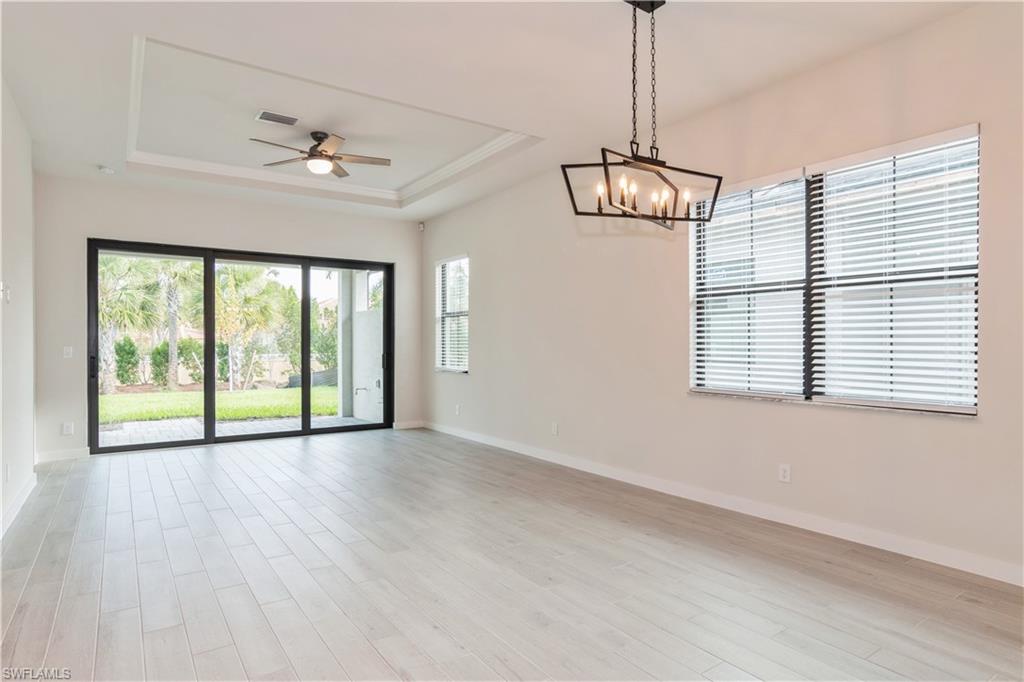 14867 Loggerhead Drive Naples, FL 34120 - Photo 8 of 21 a view of an empty room with a window