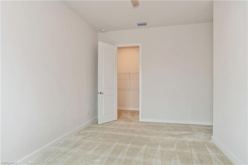 14867 Loggerhead Drive Naples, FL 34120 - Photo 10 of 21 a view of an empty room