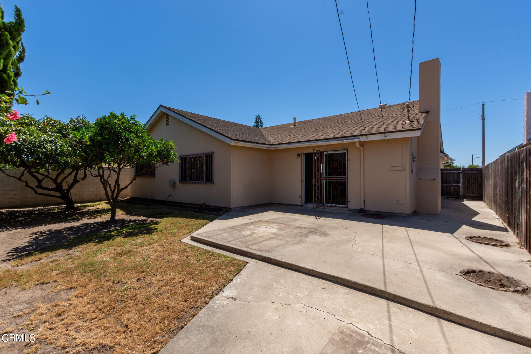 4410 Reeder Avenue Oxnard, CA 93033 - Photo 20 of 20 a backyard of a house with yard and garage