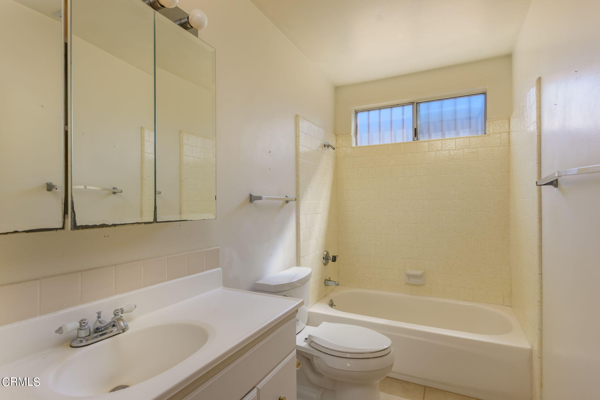 4410 Reeder Avenue Oxnard, CA 93033 - Photo 4 of 20 a bathroom with a sink toilet and shower