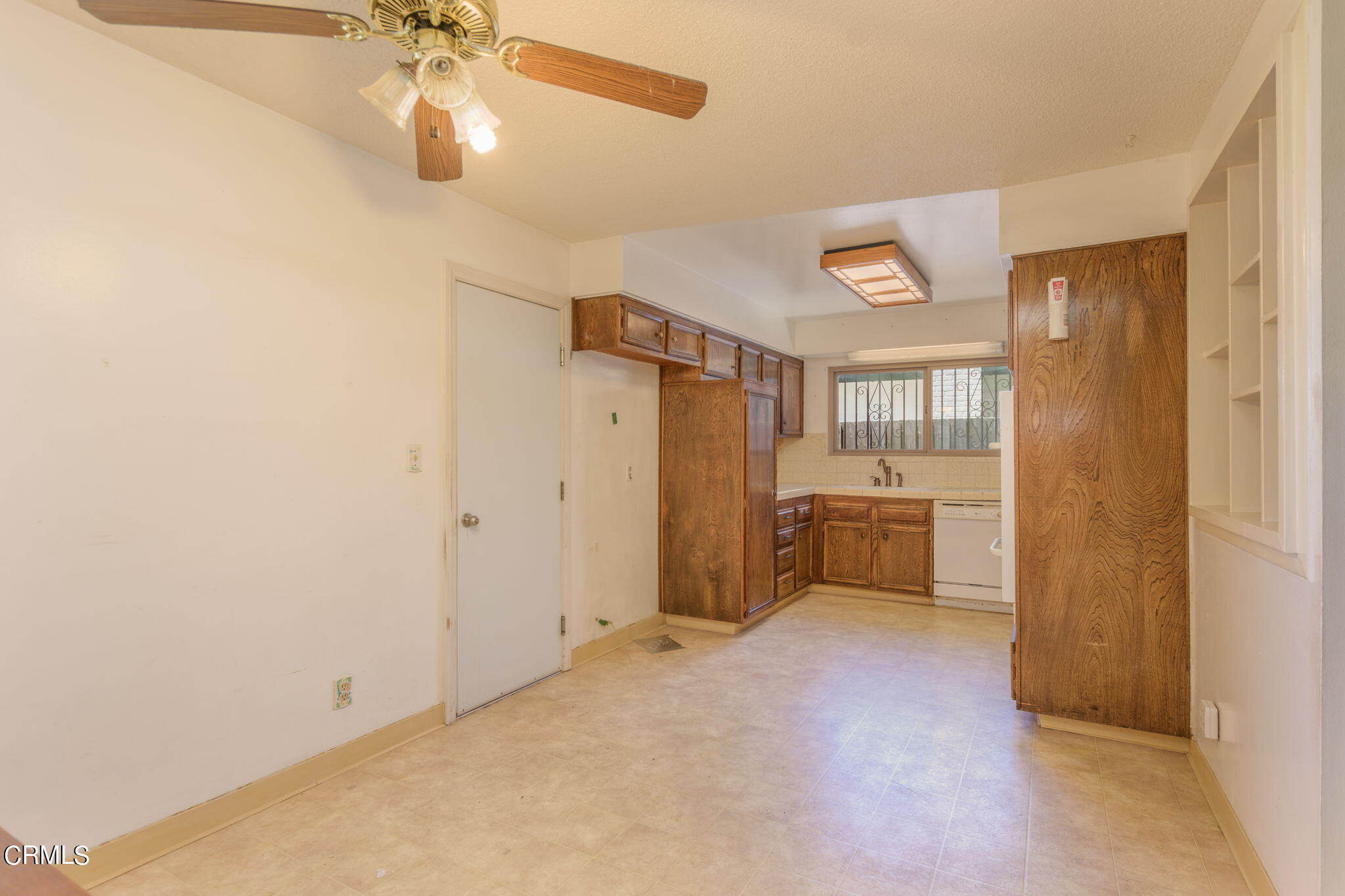 4410 Reeder Avenue Oxnard, CA 93033 - Photo 9 of 20 a view of a room with cabinet and a flat screen tv