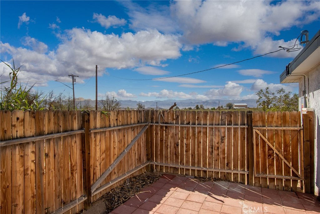 62932 Shifting Sands Joshua Tree, CA 92252 - Photo 19 of 45 a view of a balcony with an outdoor space