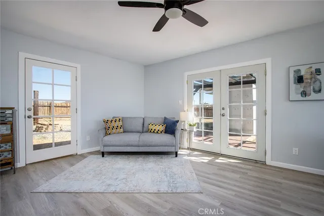 a kitchen with a sink cabinets and dining table chair