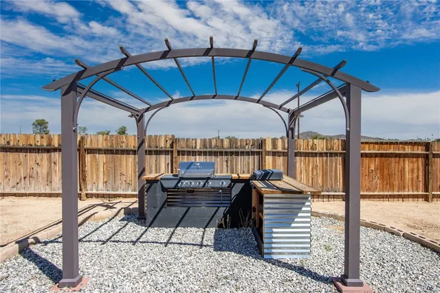 a view of a terrace with trees