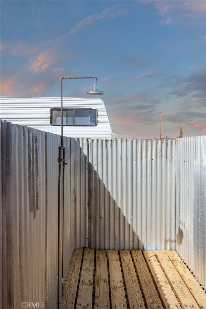 62932 Shifting Sands Joshua Tree, CA 92252 - Photo 37 of 45 a view of a balcony with wooden floor