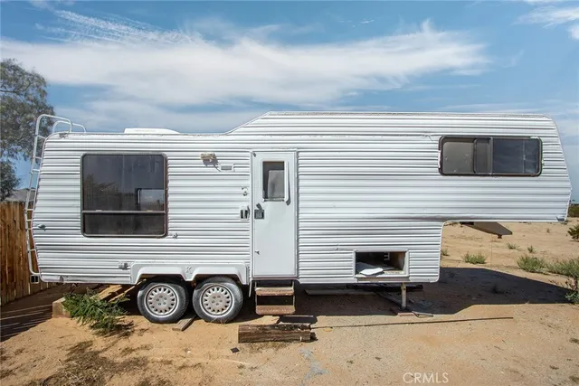 a house view with a backyard space