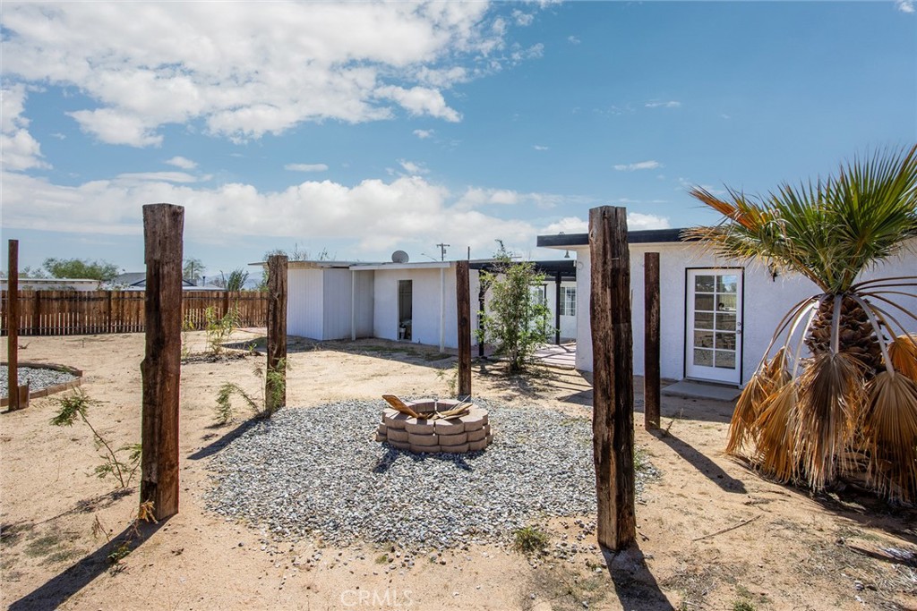 62932 Shifting Sands Joshua Tree, CA 92252 - Photo 39 of 45 a house view with a backyard space