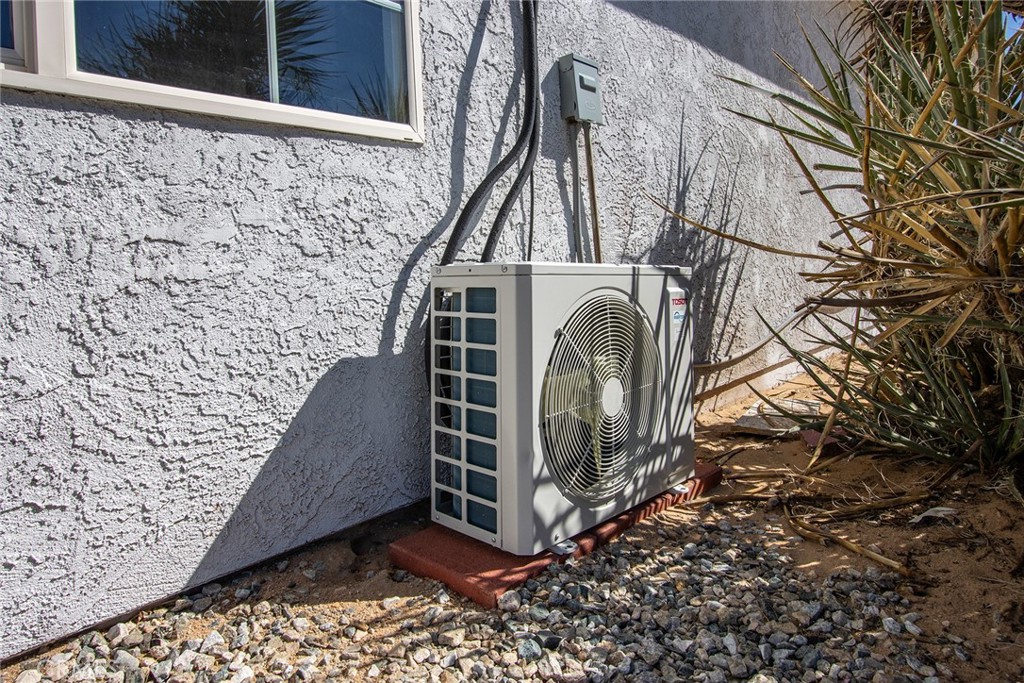 62932 Shifting Sands Joshua Tree, CA 92252 - Photo 40 of 45 a view of a hallway with wooden fence