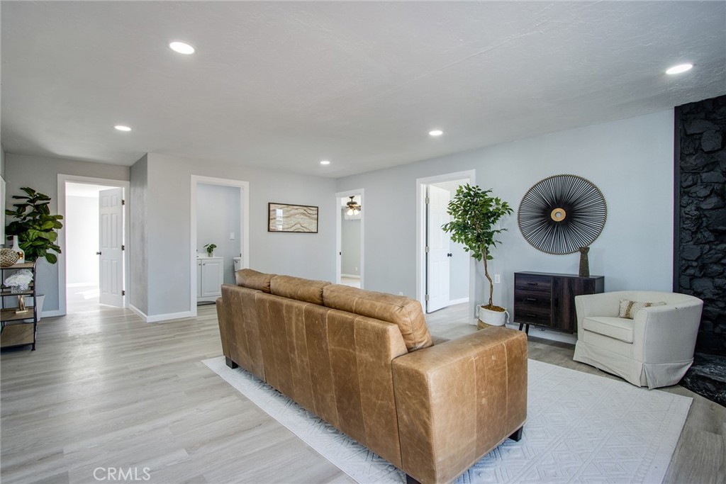 62932 Shifting Sands Joshua Tree, CA 92252 - Photo 6 of 45 a living room with furniture and a fireplace