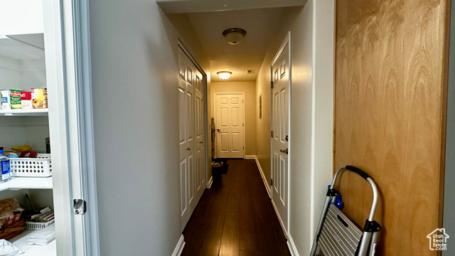 929 West 1920 South, Unit A Syracuse, UT 84075 - Photo 25 of 26 Hallway featuring dark wood-type flooring