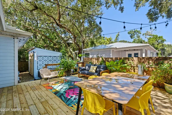 an outdoor space with seating area and furniture