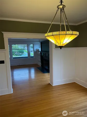 a white refrigerator freezer and a stove sitting inside of a kitchen