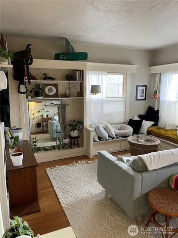 a room with furniture and a fireplace