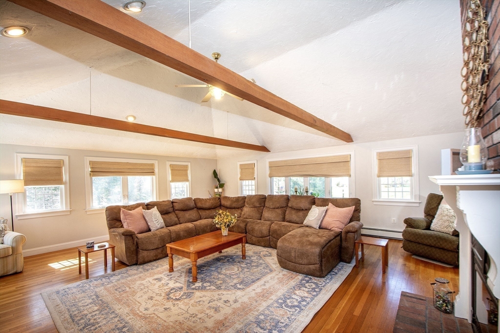 18 Longmeadow Road Scituate, MA 02066 - Photo 13 of 37 a living room with furniture and a large window