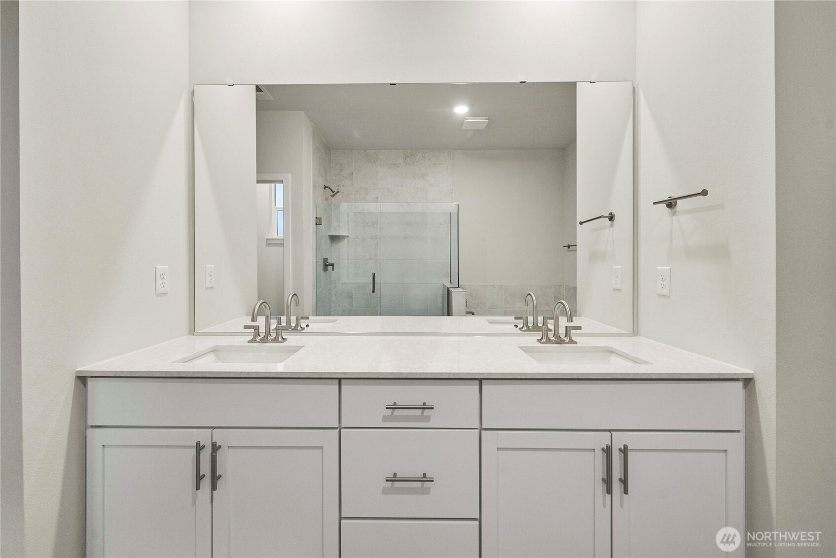 4083 Southwest Rustler Street Port Orchard, WA 98367 - Photo 19 of 32 a bathroom with a sink and a mirror