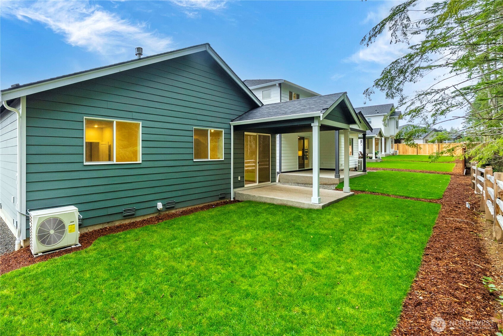 4083 Southwest Rustler Street Port Orchard, WA 98367 - Photo 32 of 32 a front view of a house with a yard
