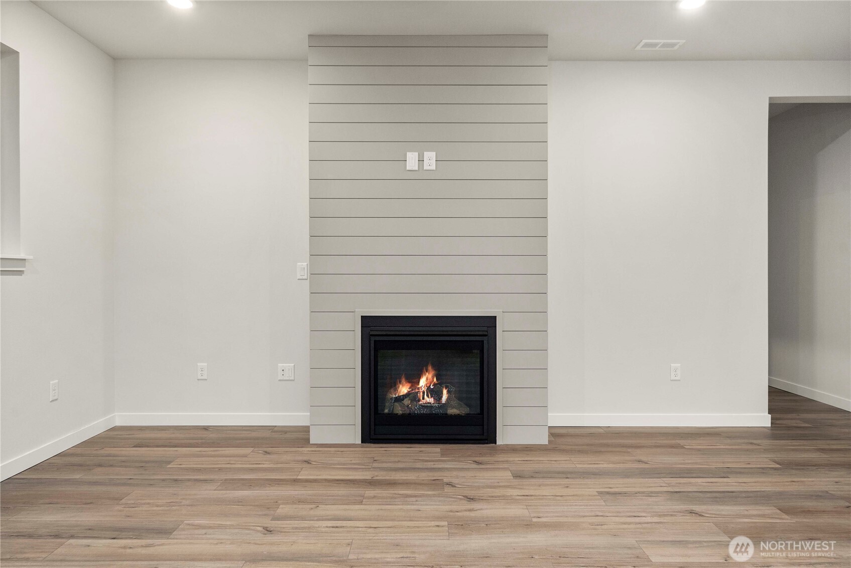 4083 Southwest Rustler Street Port Orchard, WA 98367 - Photo 5 of 32 a room with a fireplace