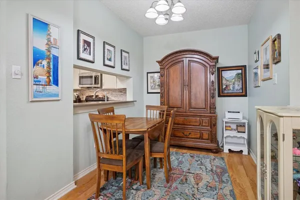 a view of a dining room with furniture