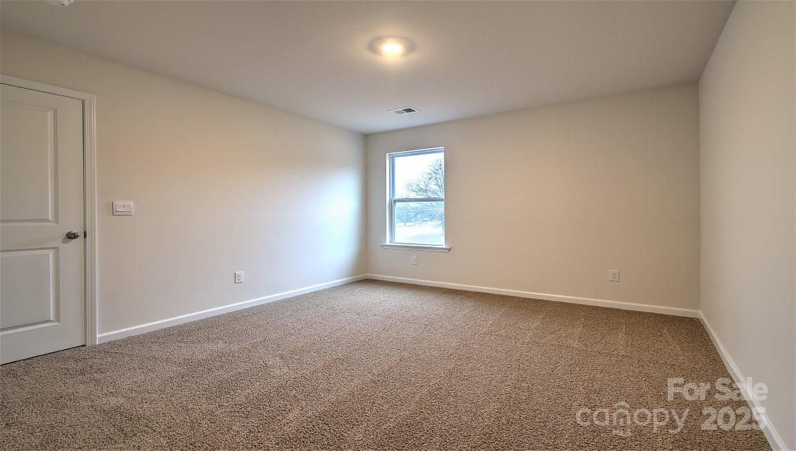 109 Salers Road Fletcher, NC 28732 - Photo 13 of 27 an empty room with windows
