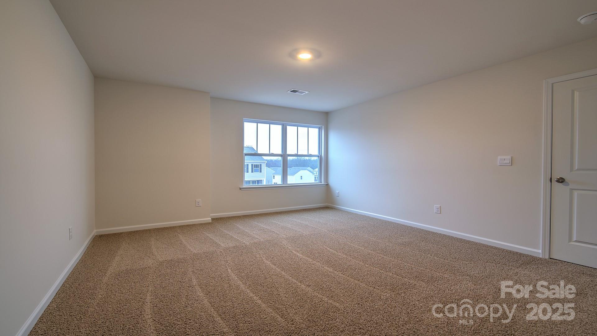 109 Salers Road Fletcher, NC 28732 - Photo 18 of 27 an empty room with windows