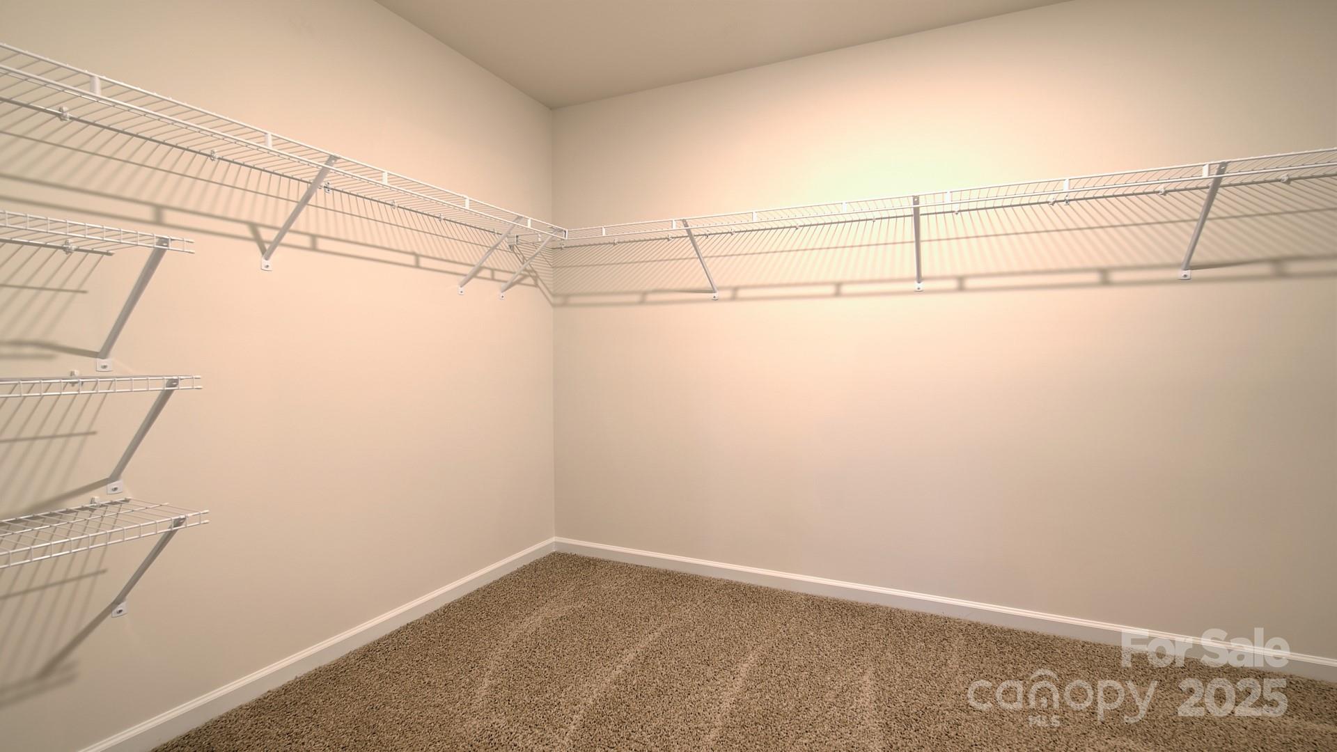 109 Salers Road Fletcher, NC 28732 - Photo 22 of 27 a view of a room with racks on the wall