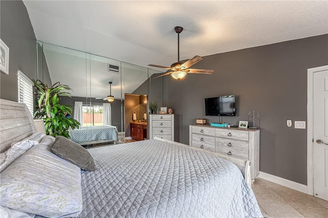 9203 Edgemont Lane Boca Raton, FL 33434 - Photo 21 of 52 Master Bedroom with vaulted ceilings