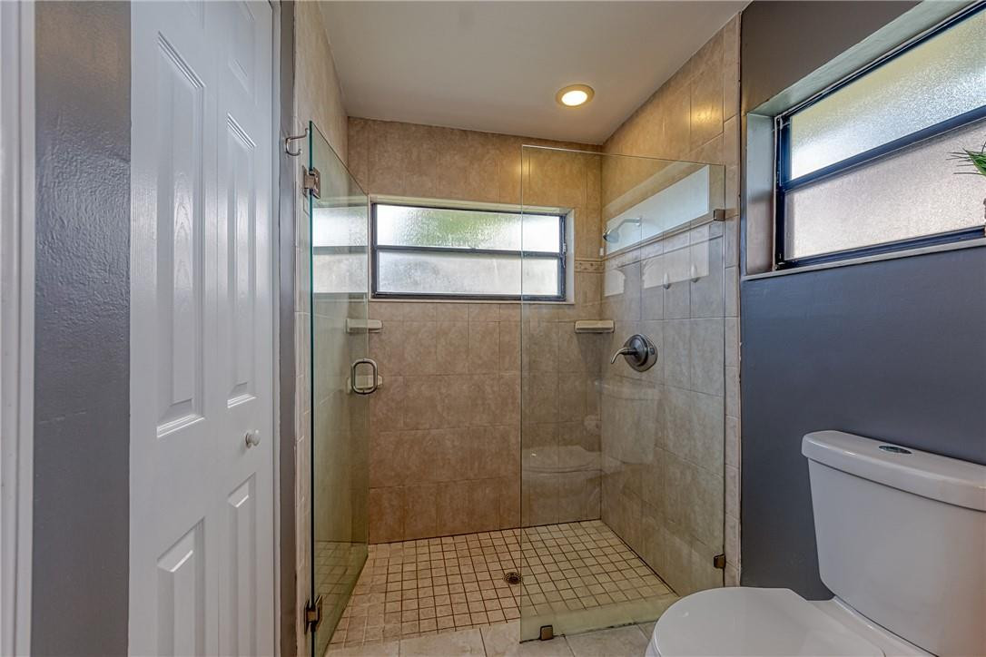 9203 Edgemont Lane Boca Raton, FL 33434 - Photo 24 of 52 Remodeled shower
