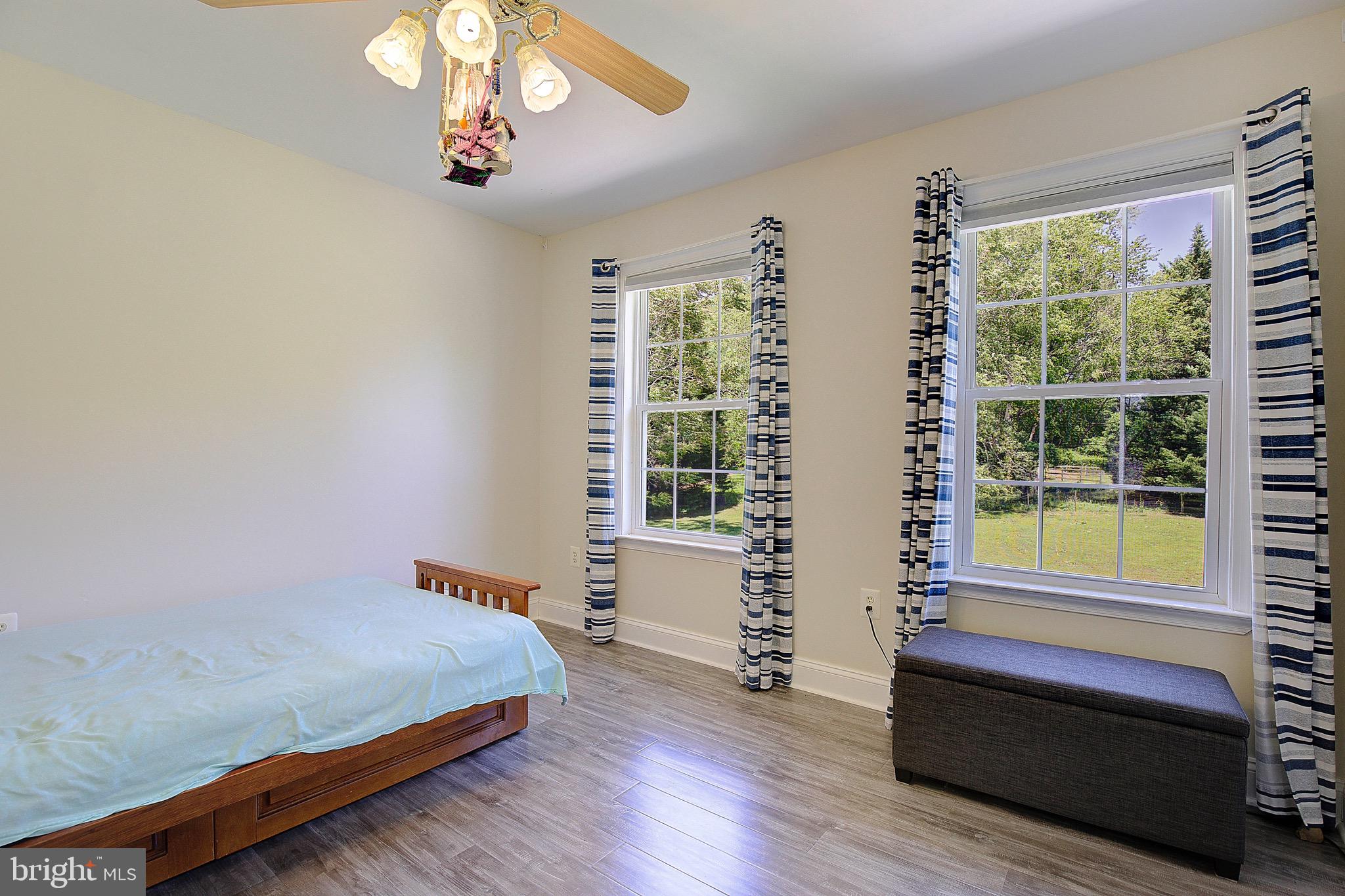 3305 Smithville Drive Dunkirk, MD 20754 - Photo 31 of 109 a bedroom with bed and window