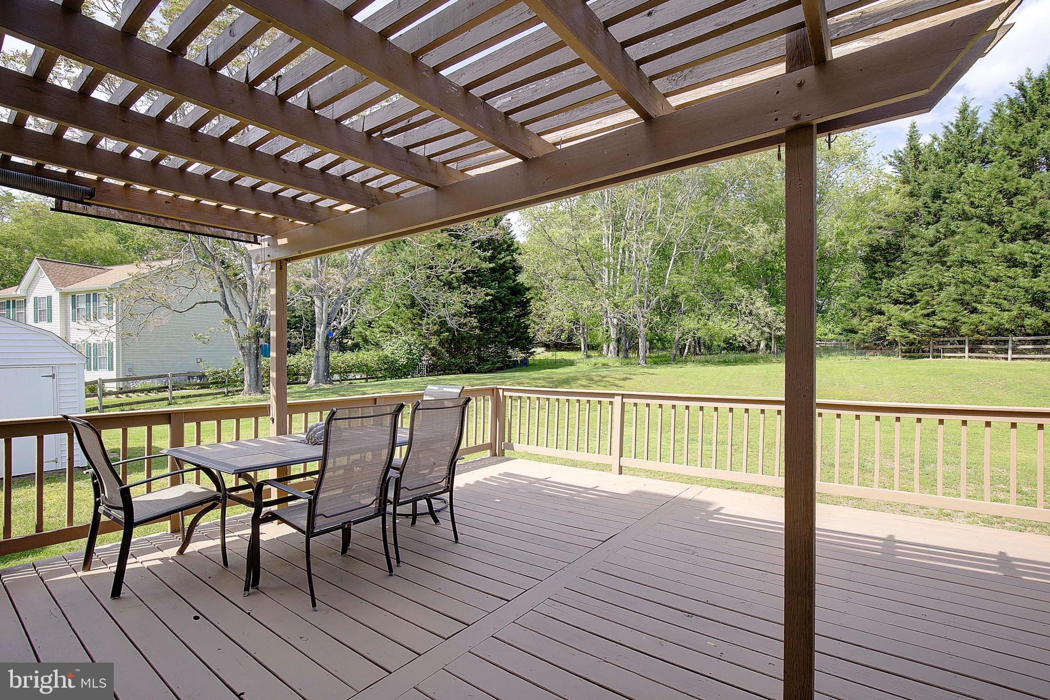 3305 Smithville Drive Dunkirk, MD 20754 - Photo 65 of 109 a view of a chairs and table on the wooden floor