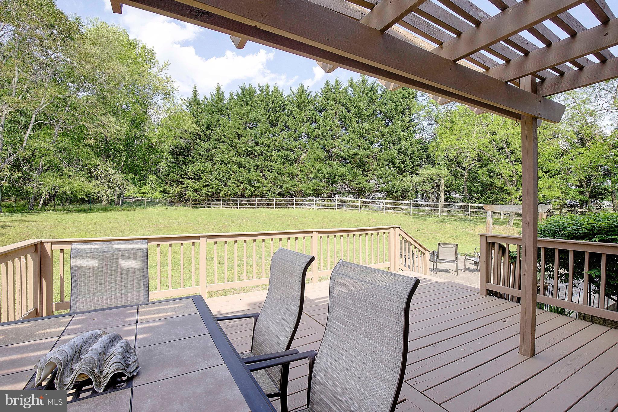 3305 Smithville Drive Dunkirk, MD 20754 - Photo 66 of 109 a view of a chairs and table in the balcony