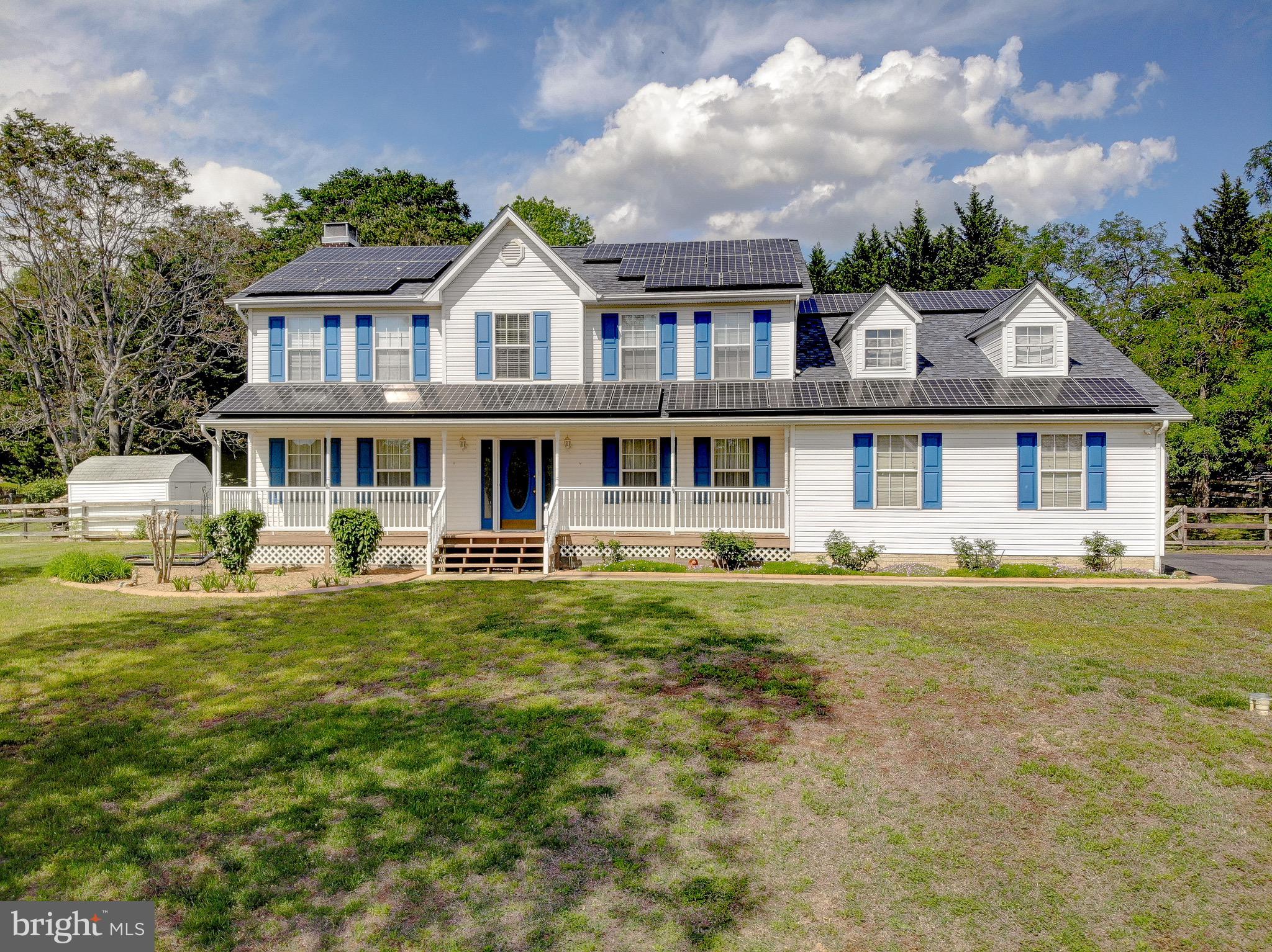 3305 Smithville Drive Dunkirk, MD 20754 - Photo 75 of 109 a front view of a house with a yard table and chairs