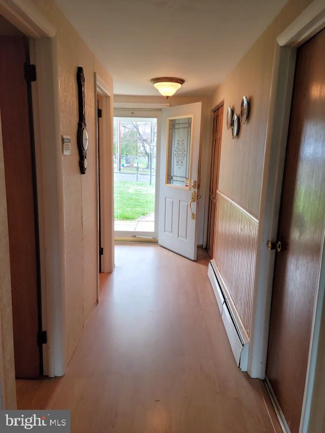 25 Brookline Road Warminster, PA 18974 - Photo 2 of 31 a view of a hallway with wooden floor and stairs