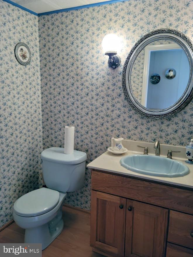 25 Brookline Road Warminster, PA 18974 - Photo 3 of 31 a bathroom with a toilet sink and mirror