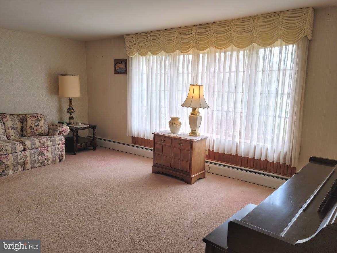 25 Brookline Road Warminster, PA 18974 - Photo 8 of 31 a living room with furniture and a window