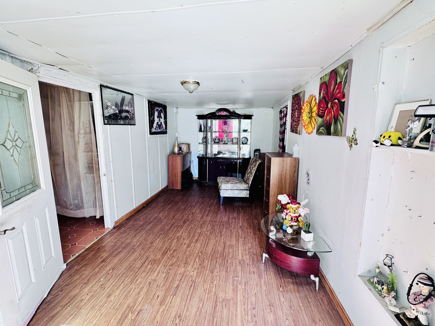 57 Robin Road Carpentersville, IL 60110 - Photo 2 of 11 a living room with furniture and a wooden floor