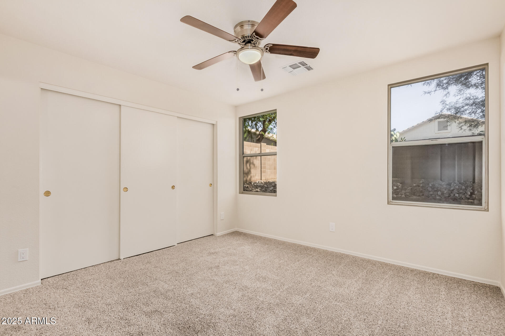 2176 West 20th Avenue Apache Junction, AZ 85120 - Photo 15 of 30 a view of an empty room with a window