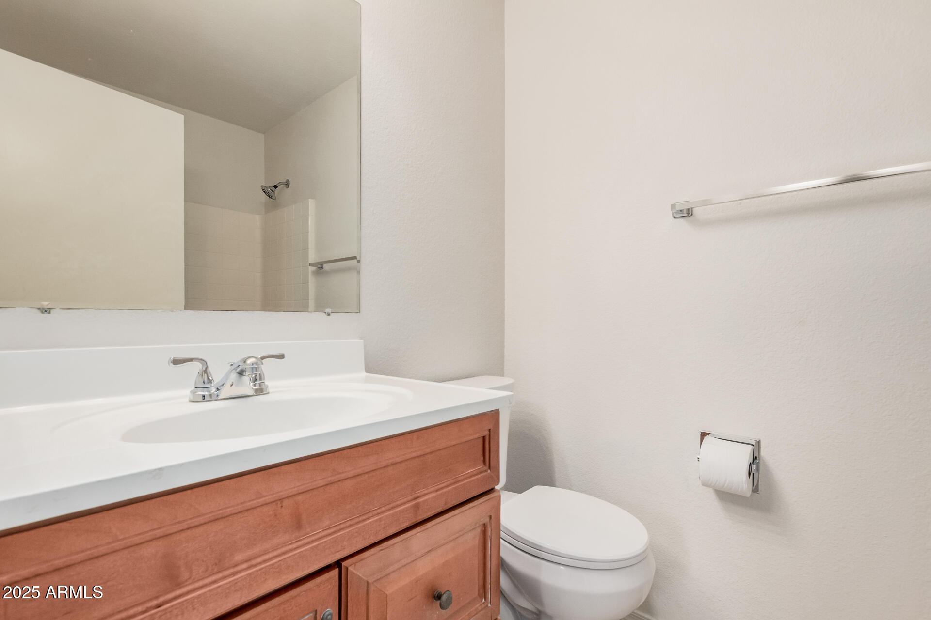 2176 West 20th Avenue Apache Junction, AZ 85120 - Photo 18 of 30 a bathroom with a sink a toilet and a mirror