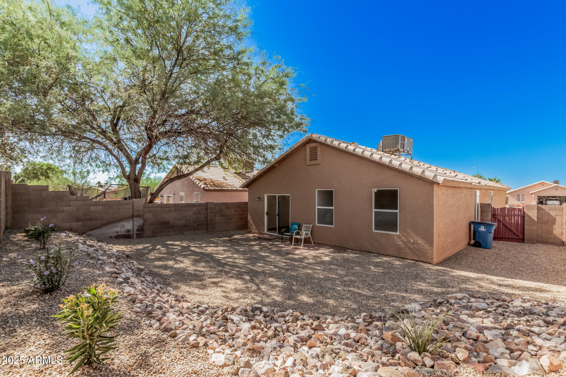 2176 West 20th Avenue Apache Junction, AZ 85120 - Photo 29 of 30 a view of a house with a yard