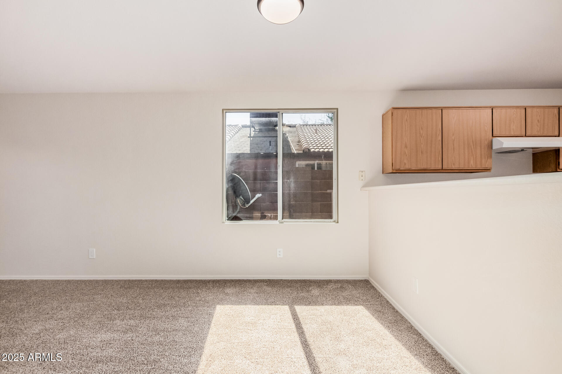 2176 West 20th Avenue Apache Junction, AZ 85120 - Photo 10 of 30 a view of an empty room with a window