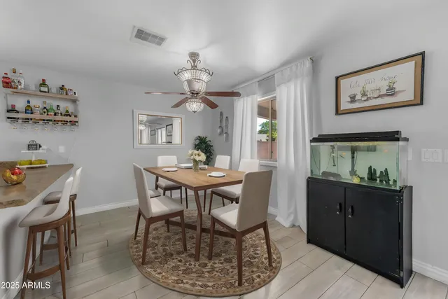 a view of storage and utility room with two washing machine