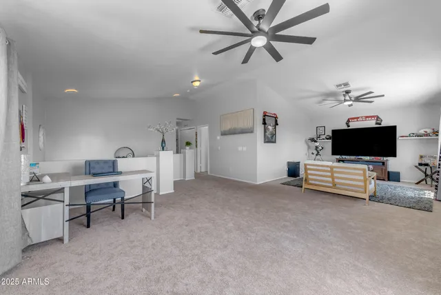 a view of a storage & utility room with racks on the wall