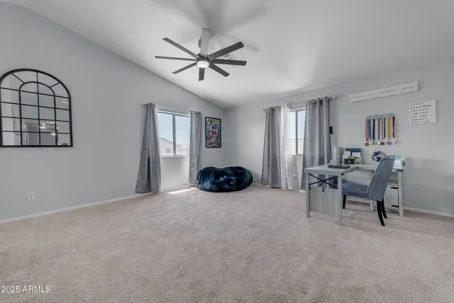 a view of a house with a yard and a slide