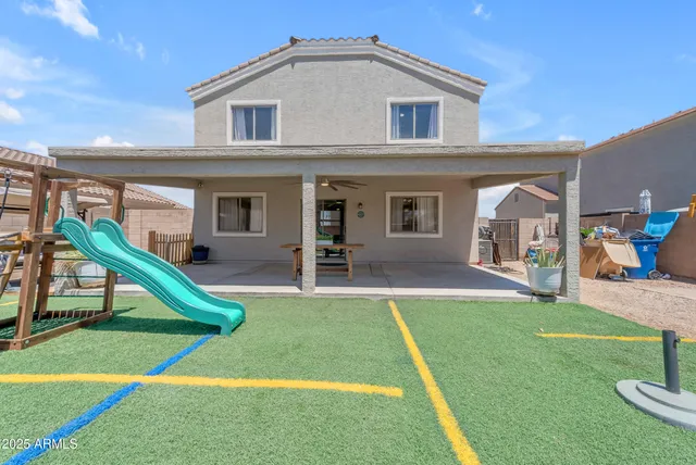a park view with a bench and trees