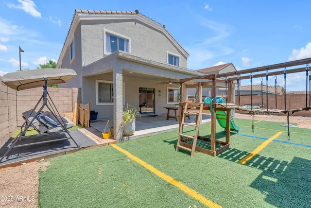 an aerial view of a house with a garden
