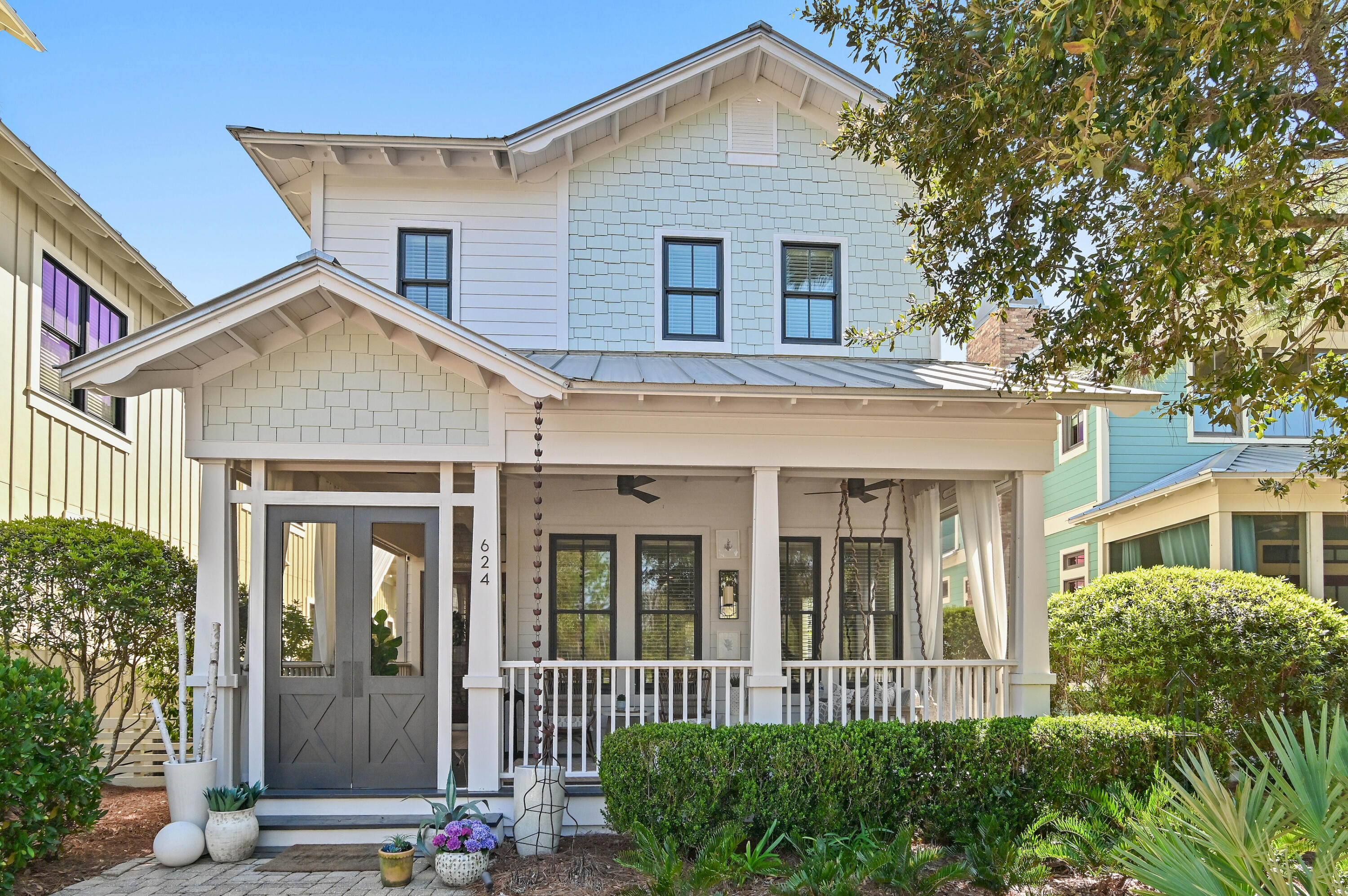 624 Sandgrass Boulevard Santa Rosa Beach, FL 32459 - Photo 2 of 51 front view of a house with a small yard
